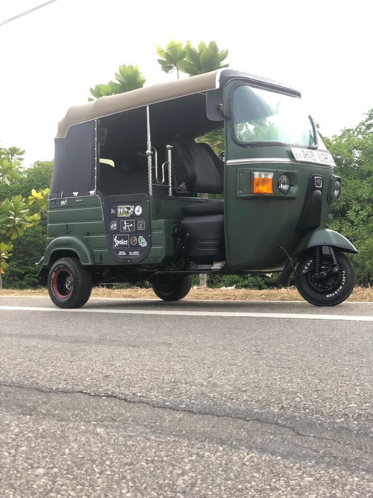 Three Wheels (Tuk-Tuk)
